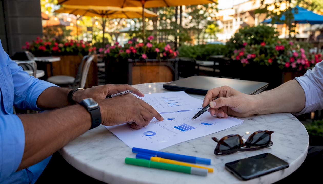 Hands reviewing LinkedIn B2B audience documents