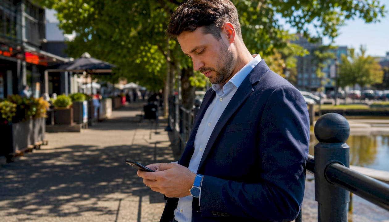 Business owner sending review request SMS